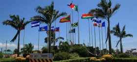 flags raised in government office in Belize  – Best Places In The World To Retire – International Living